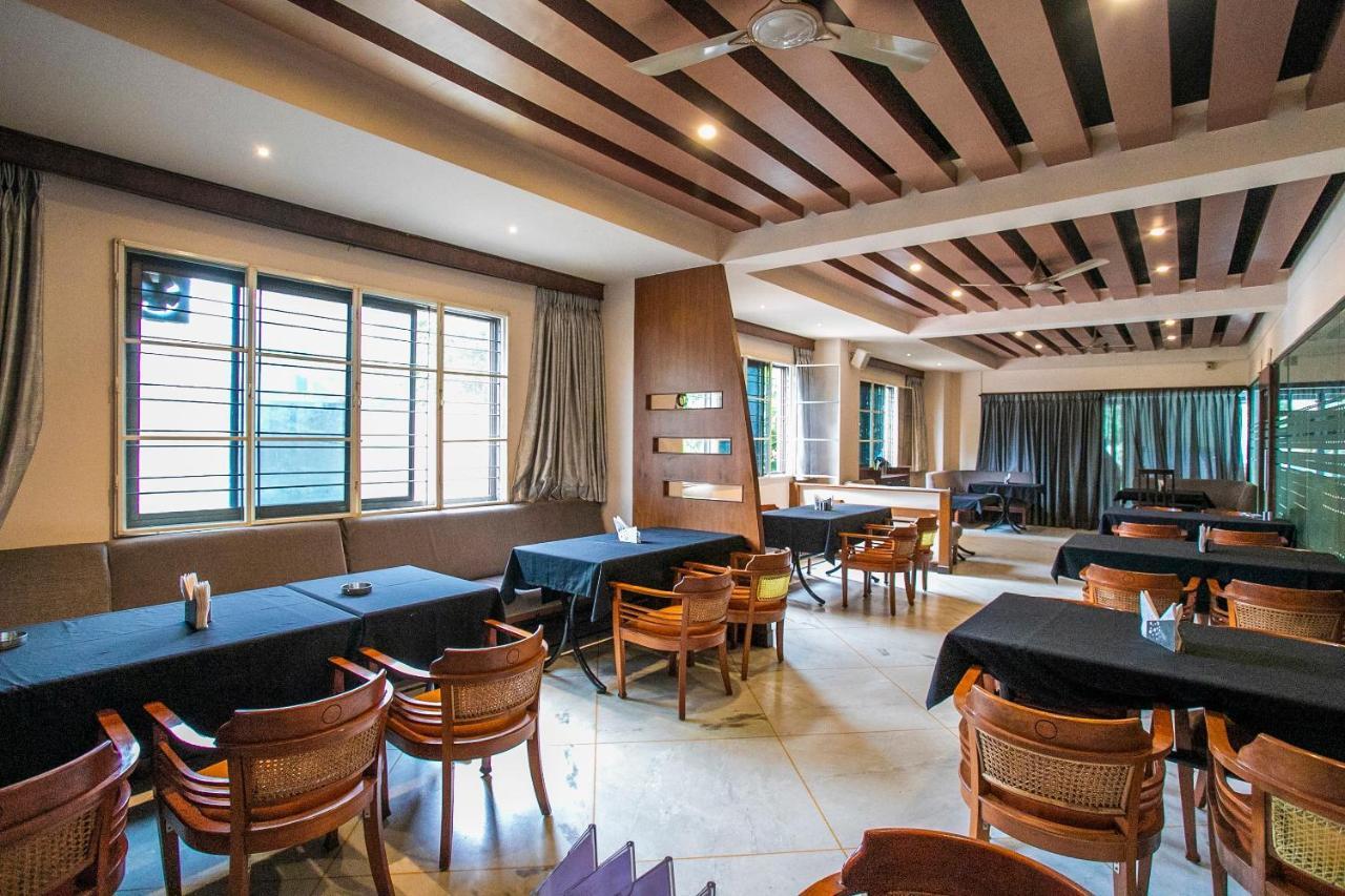 Oyo 18762 Vaishnavi Residency Hotel บังกาลอร์ ภายนอก รูปภาพ
